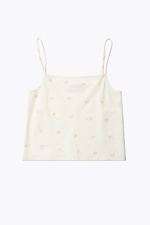 Flat Front of The Minaret Cami in Ecru Floral, a bias-cut camisole with adjustable thin straps, a rounded scoop neckline, and a straight back, made from textured seersucker cotton. Available in 5 sizes. 