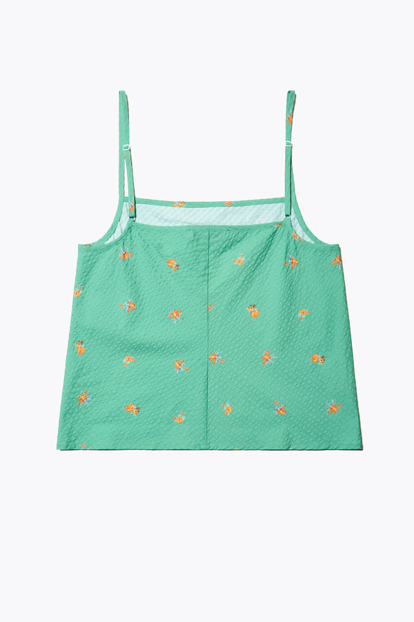 Flat back of The Minaret Cami in Green Floral, a bias-cut camisole with adjustable thin straps, a rounded scoop neckline, and a straight back, made from textured seersucker cotton. Available in 5 sizes. 
