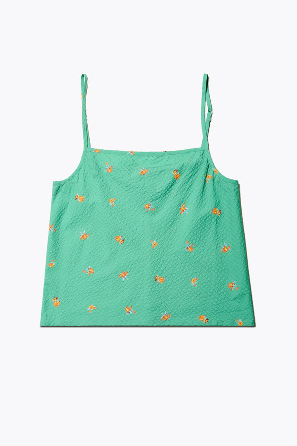 Flat Front of The Minaret Cami in Green Floral, a bias-cut camisole with adjustable thin straps, a rounded scoop neckline, and a straight back, made from textured seersucker cotton. Available in 5 sizes. 