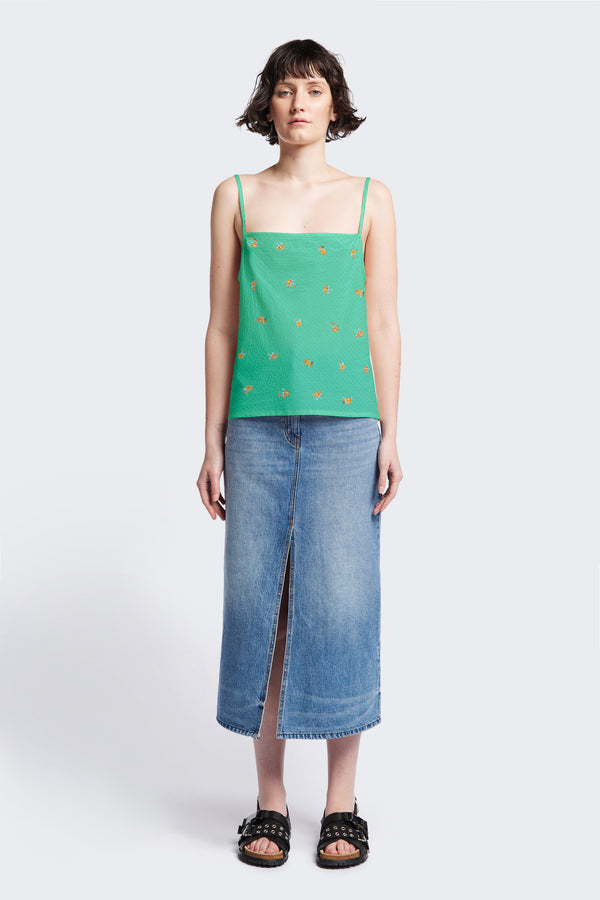 The Minaret Cami in Green Floral, a bias-cut camisole with adjustable thin straps, a rounded scoop neckline, and a straight back, made from textured seersucker cotton. Available in 5 sizes. 