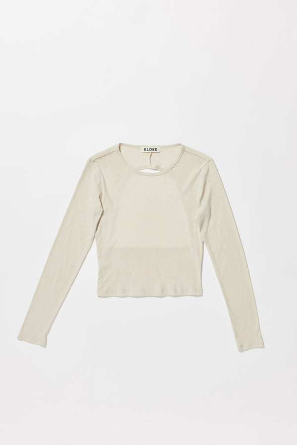 Flat front of the Mist Ballet Top in bone off white, long sleeve silhouette.