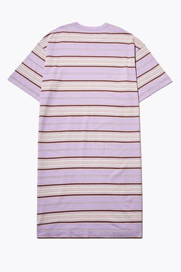 Back of the Nadir Dress in purple stripe, a laid-back style made from pure cotton jersey. This knee-length dress features side-splits, dropped shoulder, and elbow-grazing sleeves. Available in 5 sizes