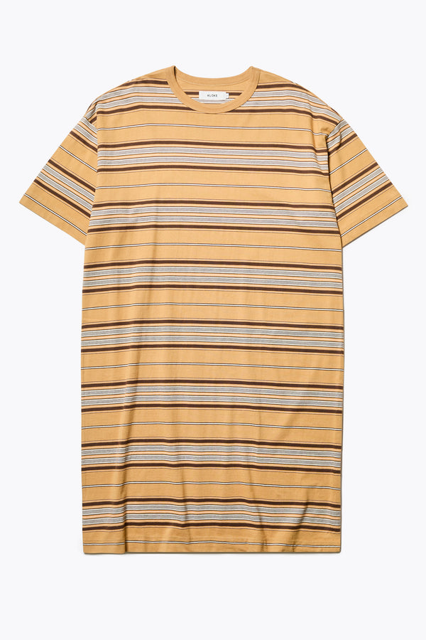 The Nadir Dress in tan stripe, a laid-back style made from pure cotton jersey. This knee-length dress features side-splits, dropped shoulder, and elbow-grazing sleeves. Available in 5 sizes. 