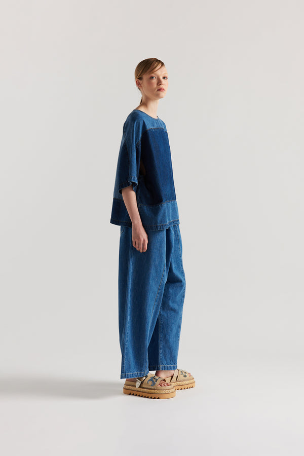 Front view of the Norton Top in Dark/Mid blue fade with Ecru tint denim, showing split underarm detail and round neck silhouette.