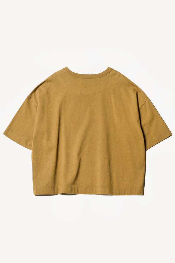 flat back of Obelisk Tee in Olive oil, showing relaxed fit and straight hem with side split