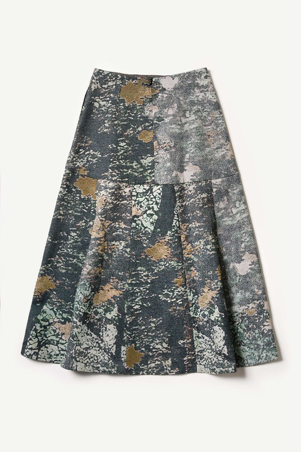 Flat Back of the Optic Skirt a midi-length A-line skirt in textured jacquard green print fabric with a forest-inspired pattern, designed by Kloke