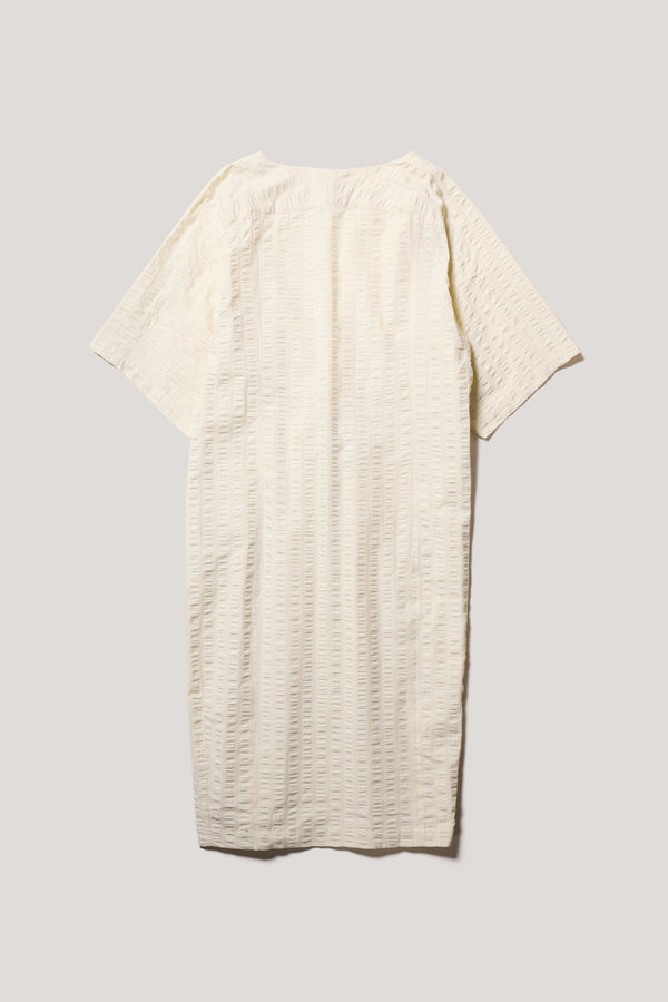 Flat back of the Origin Dress in gingham seersucker butter check. A relaxed silhouette with internal tie, clean neckline, and subtle underarm split detail.