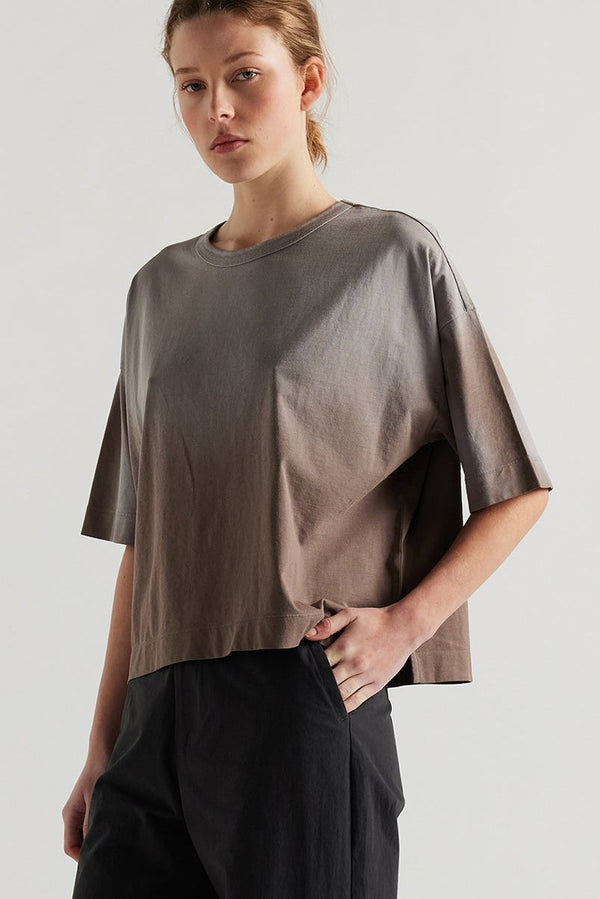 Front of Model wearing Passage Tee in brown, showcasing oversized silhouette and dropped shoulders