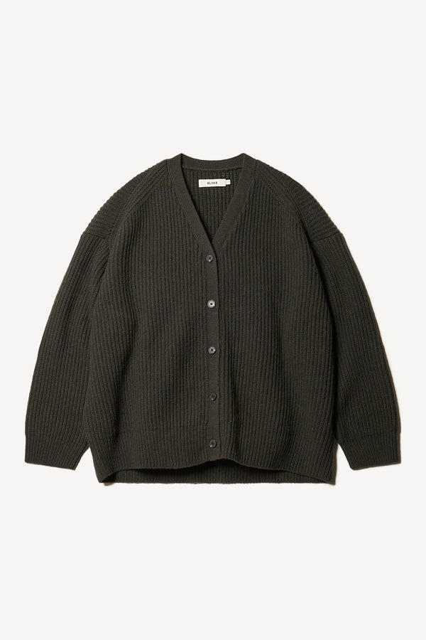 Flat Front view of the oversized ribbed wool cardigan with button closure in darkest green