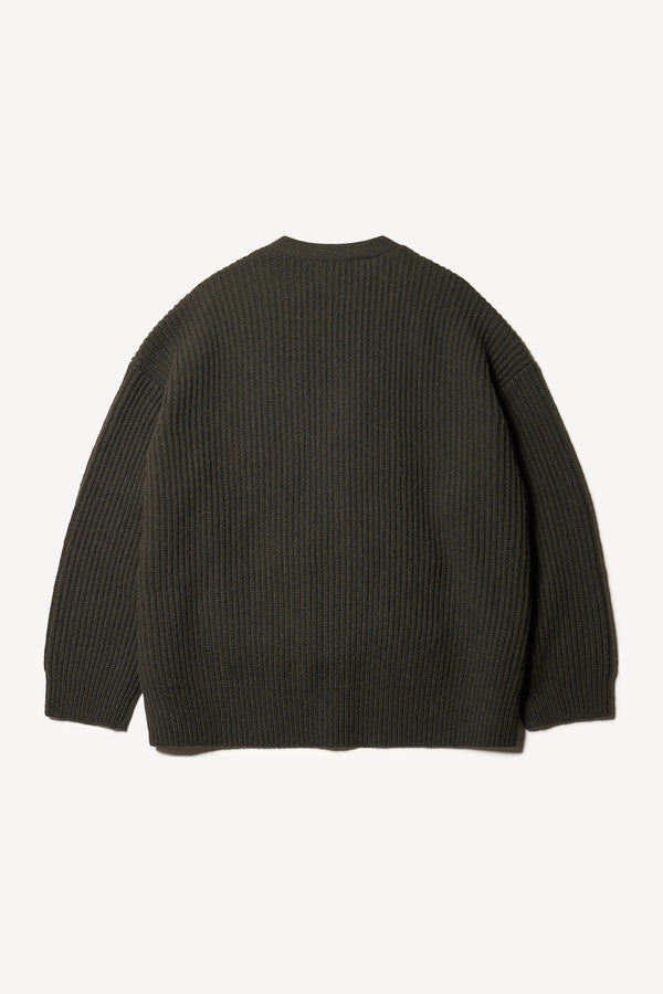 Flat back view of the oversized ribbed wool cardigan with button closure in darkest green