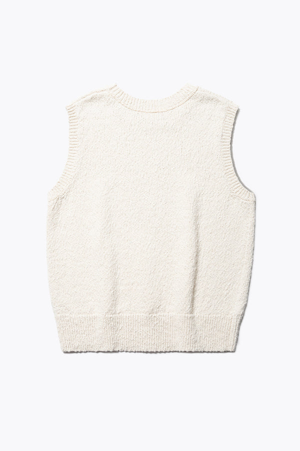 Flat back of the ecru Sleeveless textured Picknicker knit vest in soft chunky cotton, featuring ribbed trim and a 5-gauge cotton slub knit construction.