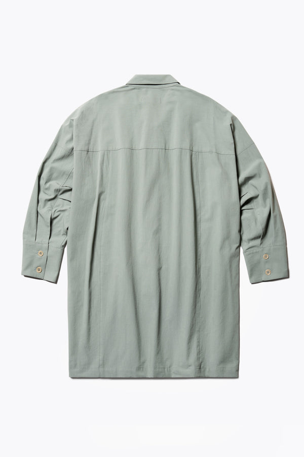 Flat Back of the Plein Long Sleeve Shirt in Olive Green. An oversized panel shirt with a cocoon back, front tuck, and pleated dropped sleeves, can be styled as a lightweight jacket.