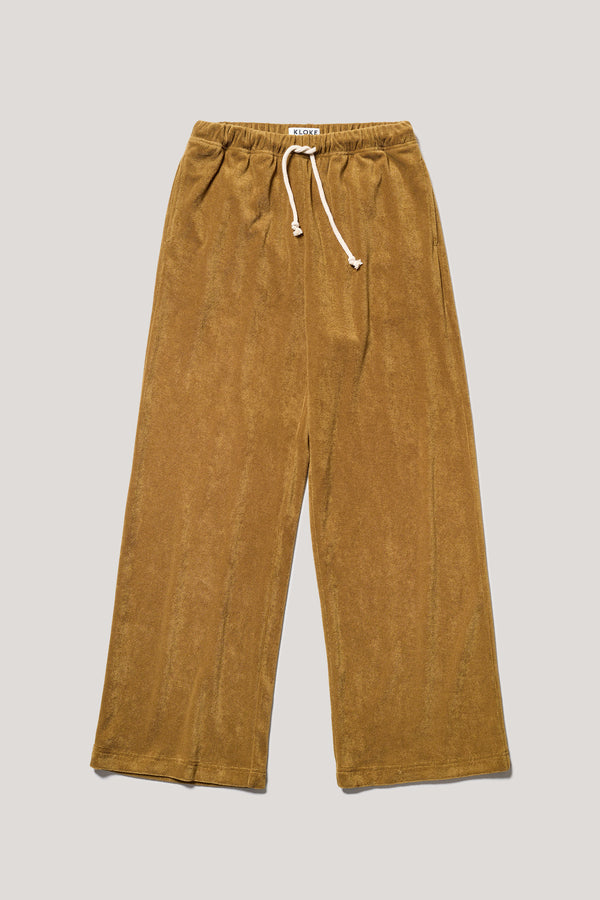 Flat front of slouchy track pants in coffee brown cotton terry with straight-leg fit and cord-tie waistband.