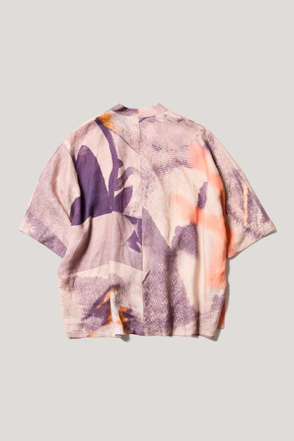 Flat front of the linen V-neck top in the Kloke Chaos print with gathered centre-front detail.