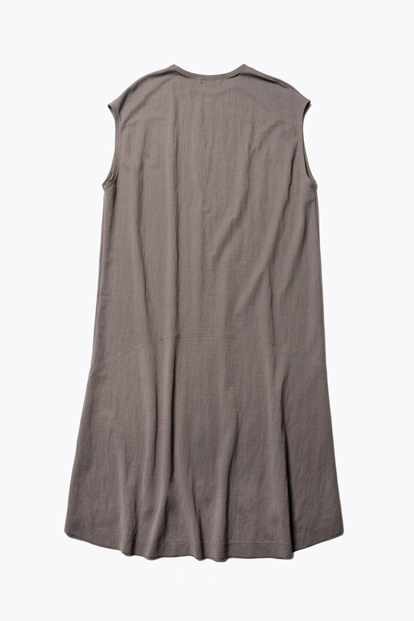 Flat Back of the Recess dress in taupe, a sleeveless crew-neck midi dress with exposed seams, raw-edge finish, and a relaxed silhouette that falls just below the knees, offering a versatile look for casual or elevated occasions.