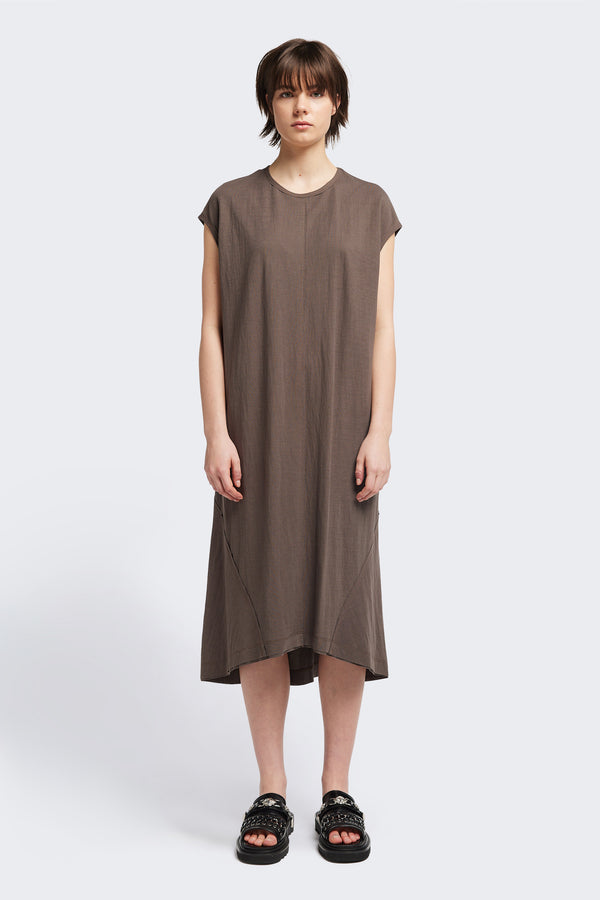 Front of the Recess dress in taupe, a sleeveless crew-neck midi dress with exposed seams, raw-edge finish, and a relaxed silhouette that falls just below the knees, offering a versatile look for casual or elevated occasions.