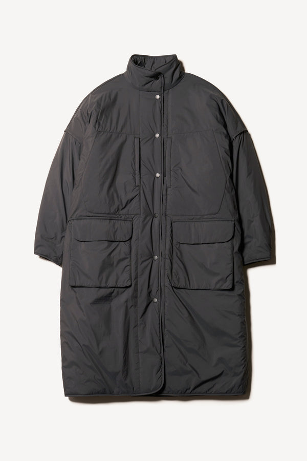 Flat Front view of the oversized Restore Coat in Black, showcasing high collar and flap pockets