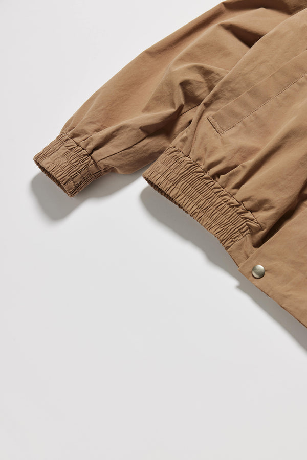 Close up Detail of Kloke hardware and elasticised cuff in fawn brown