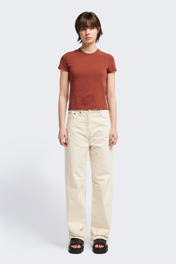 Front view of the Ride Short Sleeve top in Brick. A crew neck jersey top in Japanese cotton stretch with cap sleeves.
