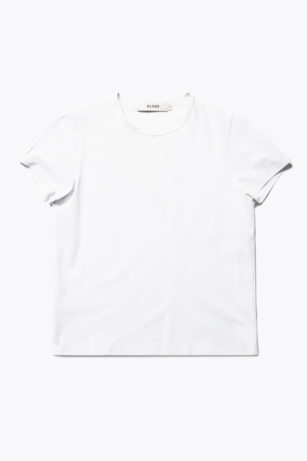 Flat Front view of the Ride Short Sleeve top in Ice Blue. A crew neck jersey top in Japanese cotton stretch with cap sleeves.
