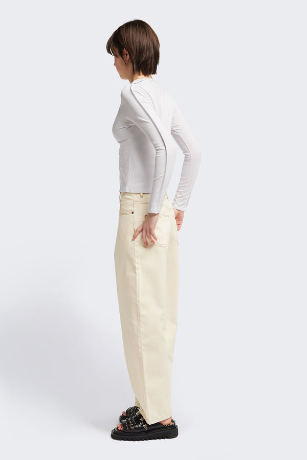 Back view of the Seclude long sleeve top in ice blue. A Slim-fit crew neck top in soft cotton stretch, featuring an exposed bound seam curving across the back and sleeves.