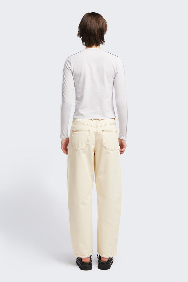 Back view of the Seclude long sleeve top in ice blue. A Slim-fit crew neck top in soft cotton stretch, featuring an exposed bound seam curving across the back and sleeves.