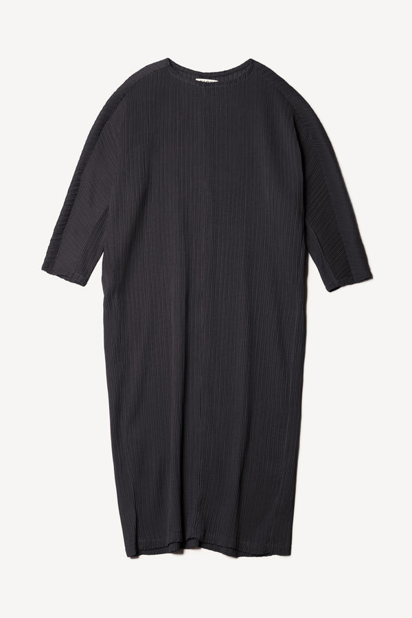 Flat front of black Sequel Dress with high neckline, midi length, and bracelet sleeves