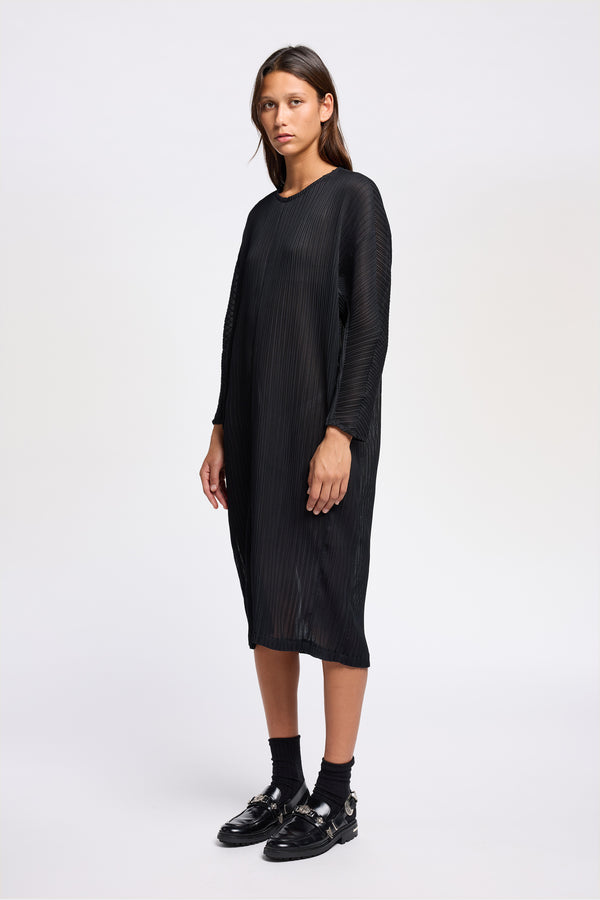 Front view of black Sequel Dress with high neckline, midi length, and bracelet sleeves