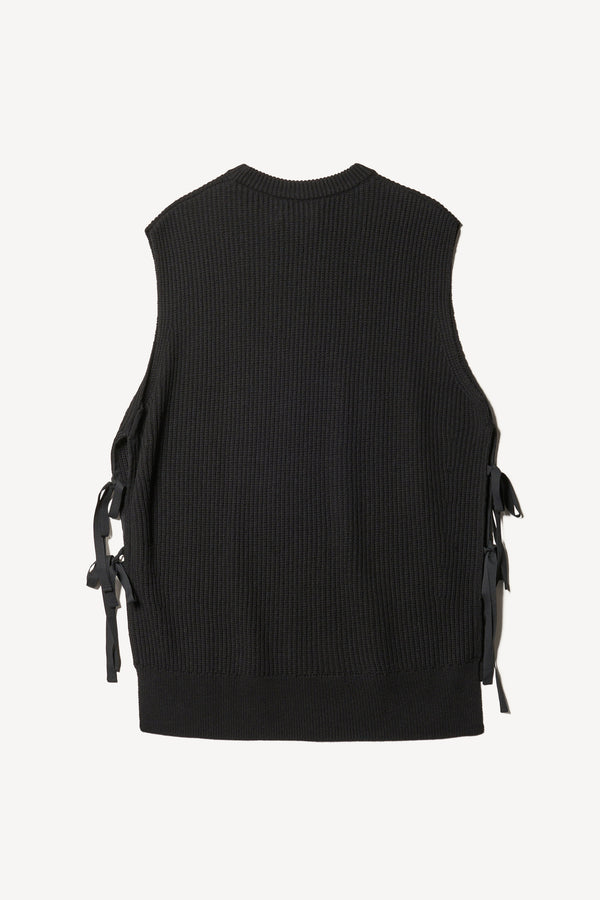 Flat Back view of black sleeveless ribbed knit vest with side ties in merino and cotton blend