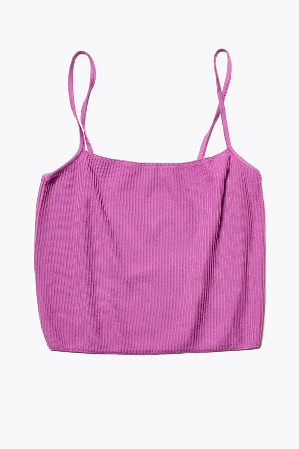 Sial Knit Cami in fuschia ribbed fabric, featuring a slim fit, round scoop neckline, and square back. The hemline sits just at the waistband, styled with a skirt or pants. Available in 5 sizes. 