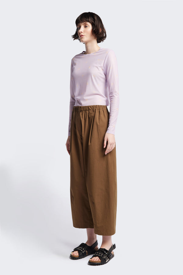 The Spring Mesh Long Sleeve Top in lilac floral, featuring a delicate floral print on lightweight, sheer mesh fabric. Ideal for layering under dresses or shirts. Available in 6 sizes. 