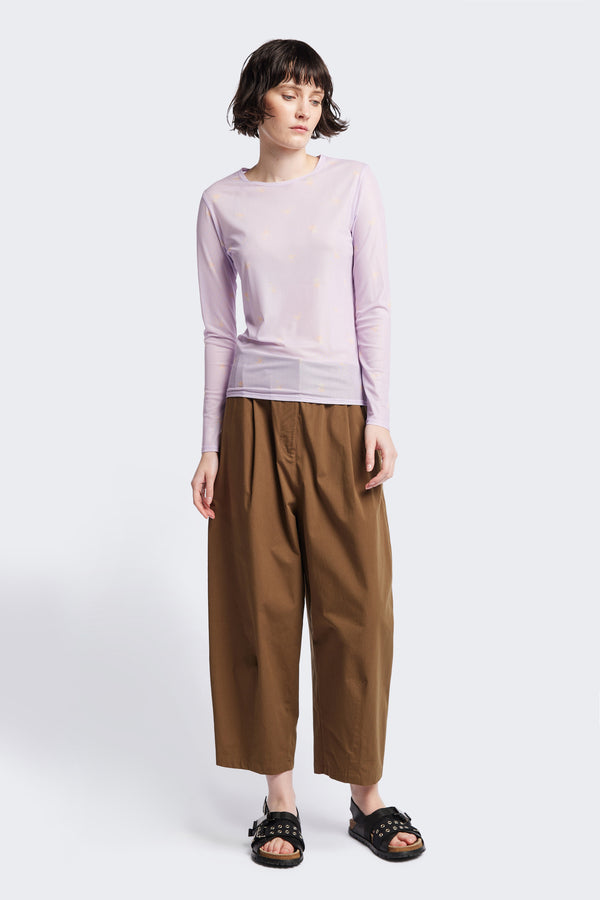 The Spring Mesh Long Sleeve Top in lilac floral, featuring a delicate floral print on lightweight, sheer mesh fabric. Ideal for layering under dresses or shirts. Available in 6 sizes. 