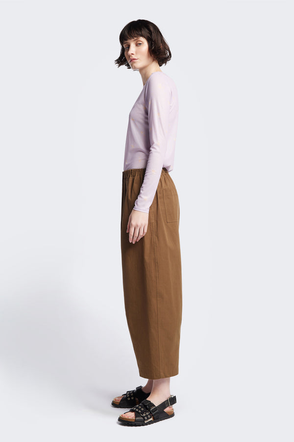 Side of the Spring Mesh Long Sleeve Top in lilac floral, featuring a delicate floral print on lightweight, sheer mesh fabric. Ideal for layering under dresses or shirts. Available in 6 sizes. 