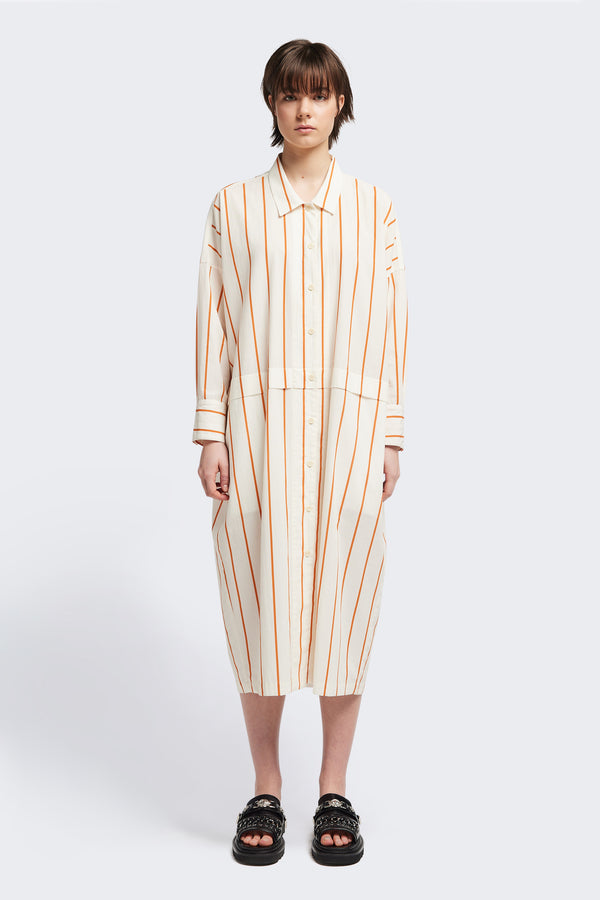 Front view of the Sundown Shirt Dress in Burnt Orange Stripe, a relaxed-fit, knee-length shirt dress with a cocooned back and front tuck detail.