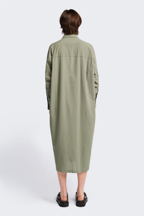 Back view of the Sundown Shirt Dress in Olive Green, a relaxed-fit, knee-length shirt dress with a cocooned back and front tuck detail.