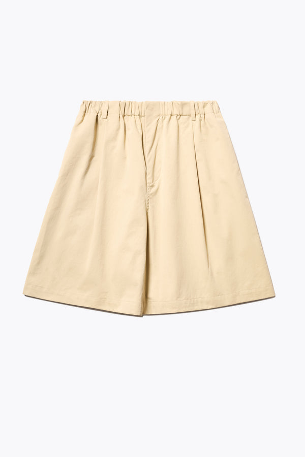 The Terme Short in Sand, Relaxed and effortless wide-leg shorts with an elastic waistband, side pockets, and made from a breathable herringbone twill. Available in 5 sizes.