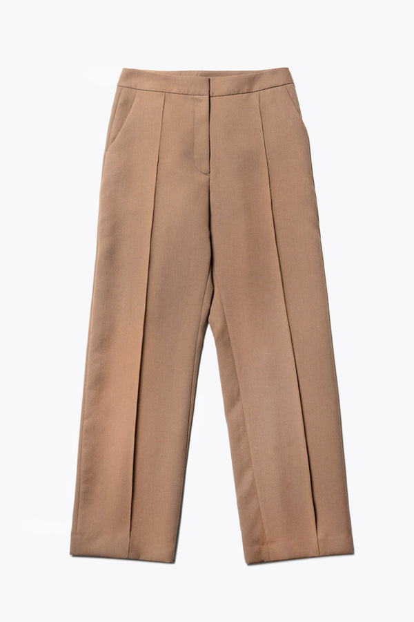 Flat Front view of the Tranquillity Pant in brown, a slim-fit stovepipe-style tailored pant with pin tuck detailing.