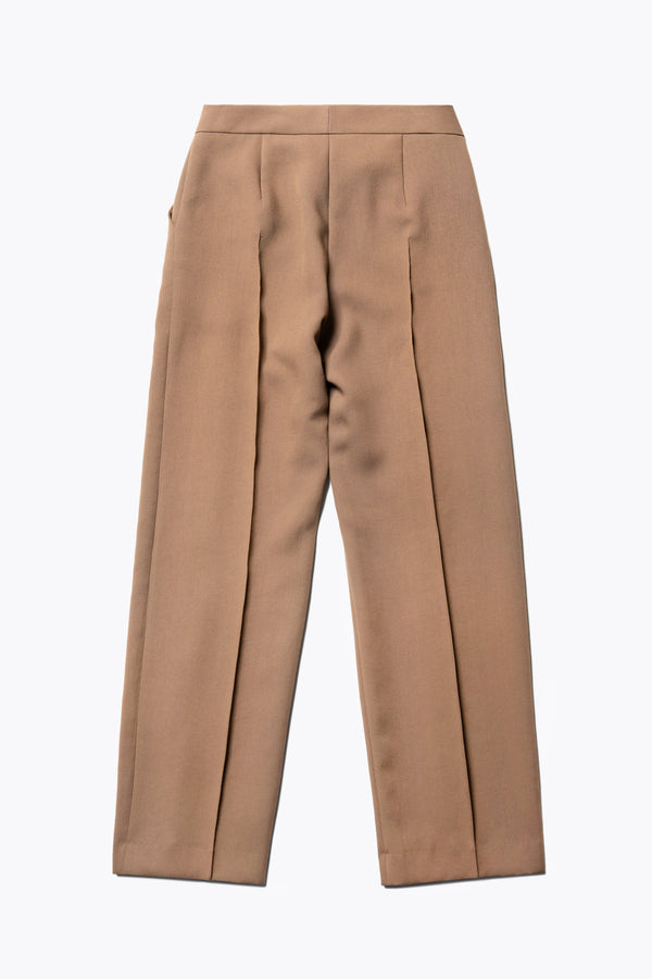 Flat Back view of the Tranquillity Pant in brown, a slim-fit stovepipe-style tailored pant with pin tuck detailing.