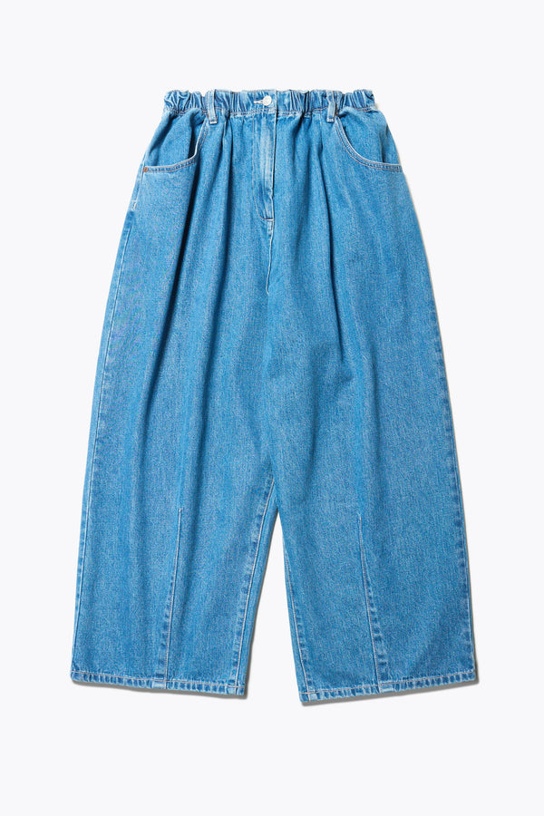 Flat Front of the Tunnel Denim Pant in mid Blue, with a relaxed fit, wide tapered leg, and elasticated waistband, made from lightweight Japanese cotton denim. Available in 5 sizes. 