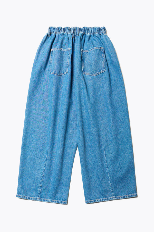 Flat Back of the Tunnel Denim Pant in mid Blue, with a relaxed fit, wide tapered leg, and elasticated waistband, made from lightweight Japanese cotton denim. Available in 5 sizes. 