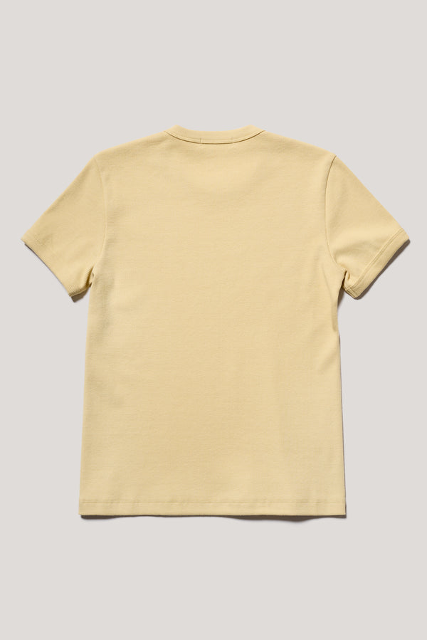 Flat back of slim-fit 70s-inspired ringer tee in Pale yellow, made from Japanese ribbed cotton.