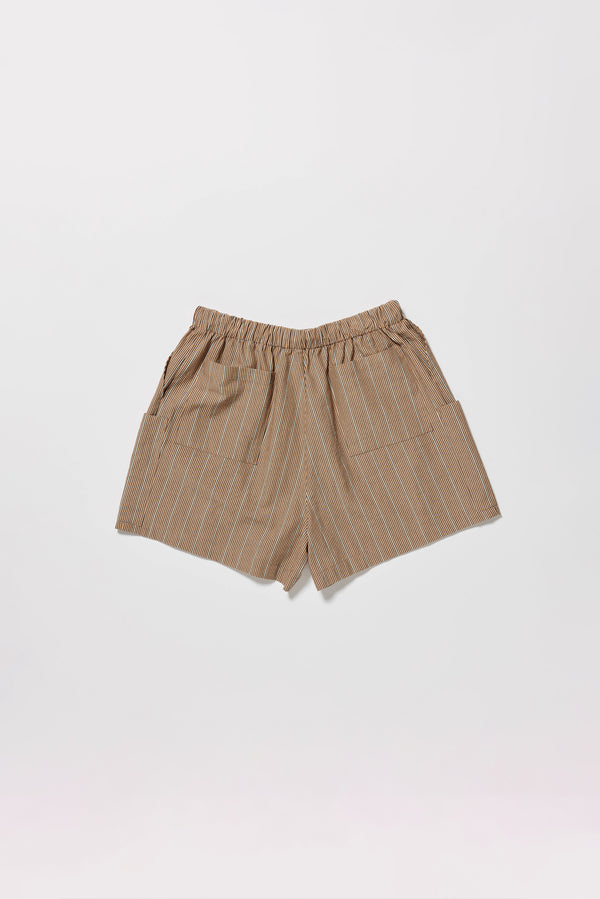 Flat back of the burnt orange, ecru and black stripe vesper short, a wide loose fit short with elasticated waistband. 