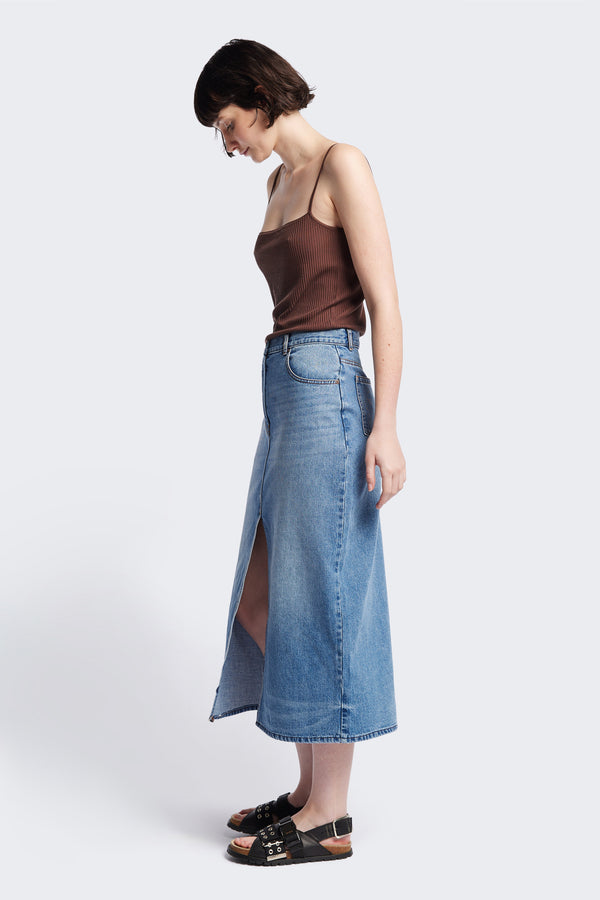 Side of The Vivendi Skirt a Straight denim pencil skirt with a front split and midi length, crafted from 12oz Japanese denim. Available in 6 sizes. 