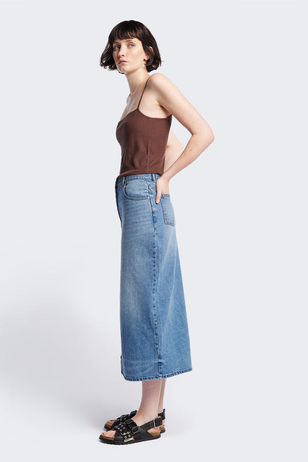 Side of The Vivendi Skirt a Straight denim pencil skirt with a front split and midi length, crafted from 12oz Japanese denim. Available in 6 sizes. 