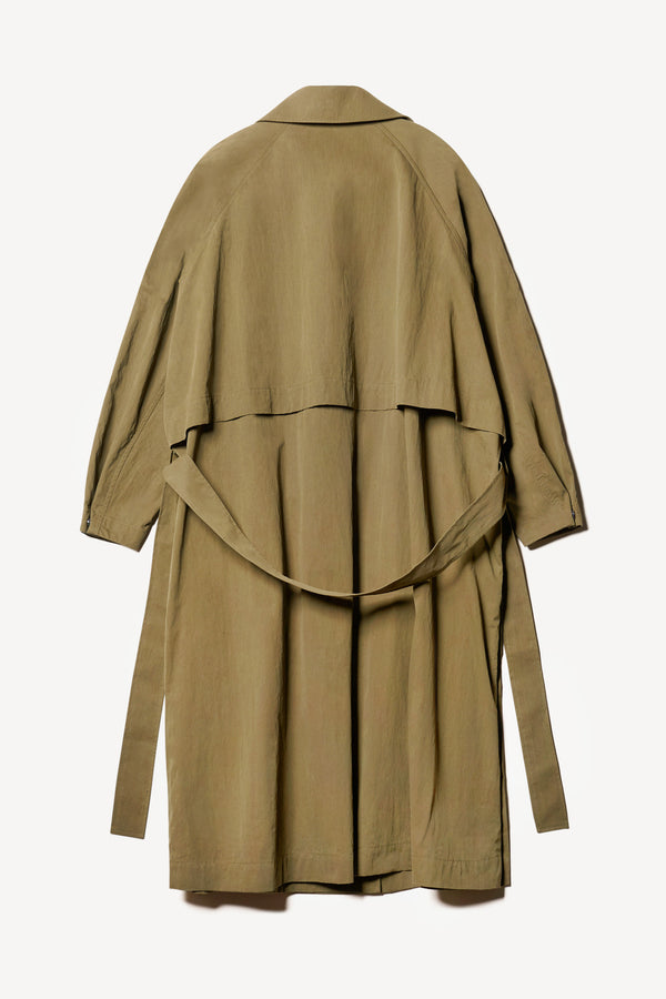 Flat Back of the Volt Trench in Kelp Green, collar up. A lightweight double-breasted trench coat with flap pockets