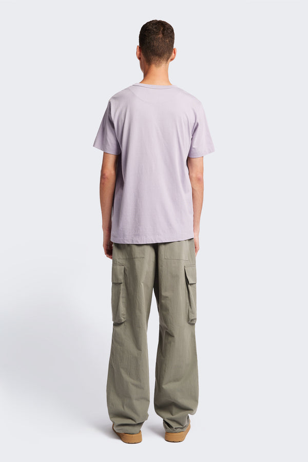 The back of the Men's Modulate Cargo Pant, a classic cargo pant with a super relaxed fit. Made from mid-weight cotton drill in Grey and features a six pockets including feature flap and stud closing side pockets.