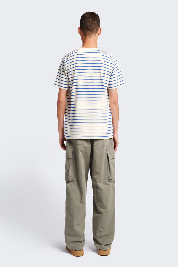 The back of the Radius T-Shirt Blue Stripe, a traditional and relaxed cotton tee with a 1 x 1 rib-bound cover-stitched neckline that's reinforced at the back. 