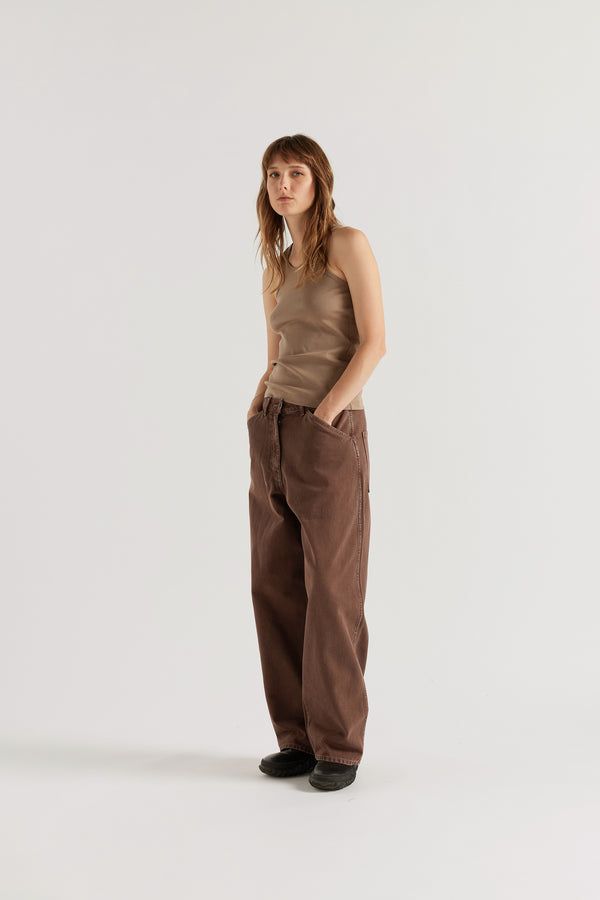 Three-quarter view of the Breaker Tank in Fawn showing slim fit silhouette and shape-retaining Japanese organic cotton rib construction