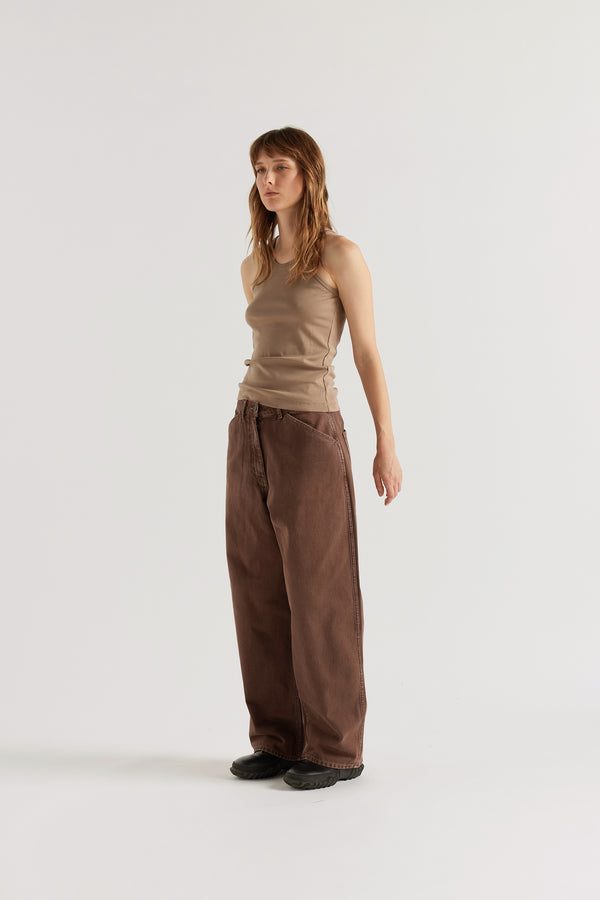 Three-quarter view of the Breaker Tank in Fawn showing slim fit silhouette and shape-retaining Japanese organic cotton rib construction