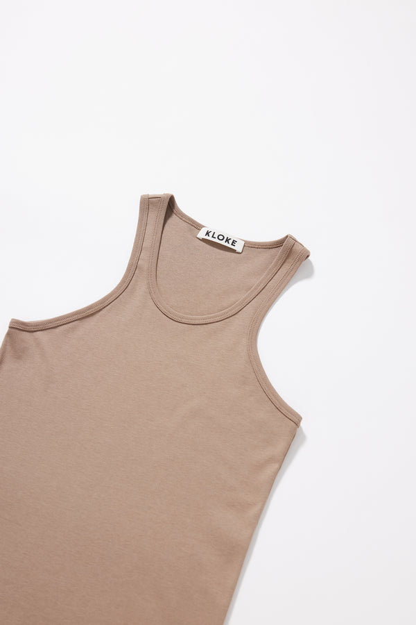 Close-up of premium Japanese 1x1 organic cotton rib texture on the Breaker Tank in Fawn showing shape-retaining construction